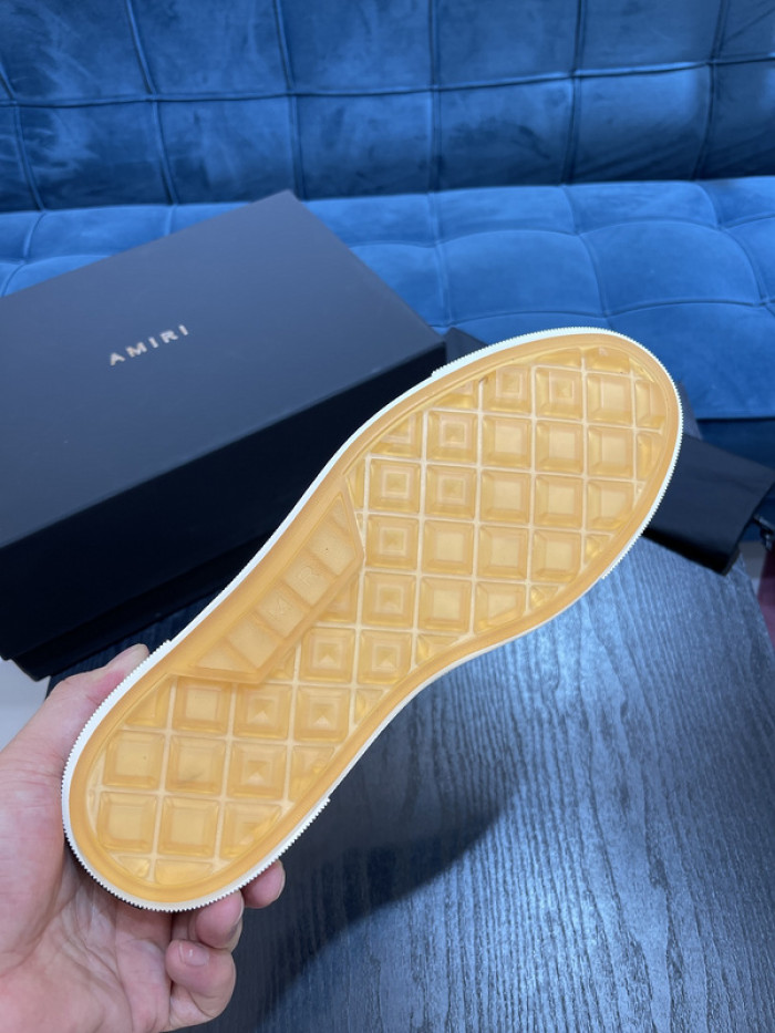 amiri* appliquéd leather and canvas sneakers