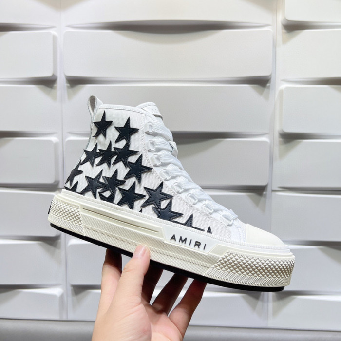 amiri* appliquéd leather and canvas sneakers